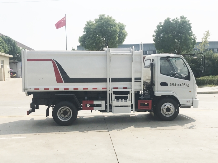 國(guó)六藍(lán)牌凱馬側(cè)掛桶式垃圾車