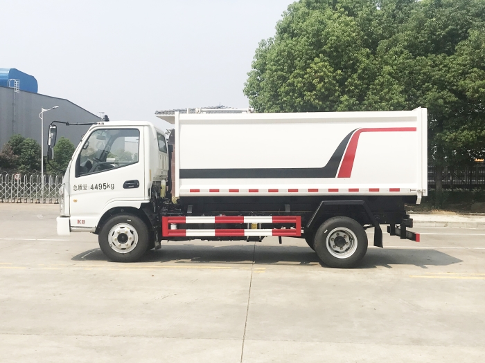 國(guó)六藍(lán)牌凱馬側(cè)掛桶式垃圾車
